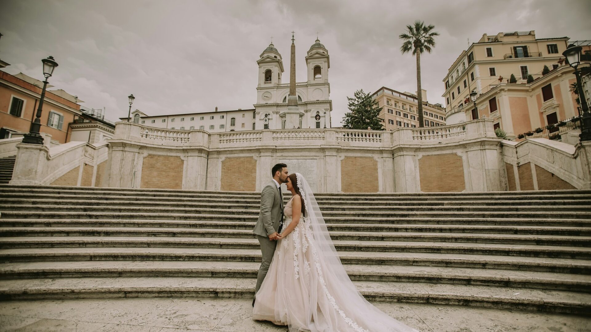 Young wedding couple on Spanish stairs in Rome