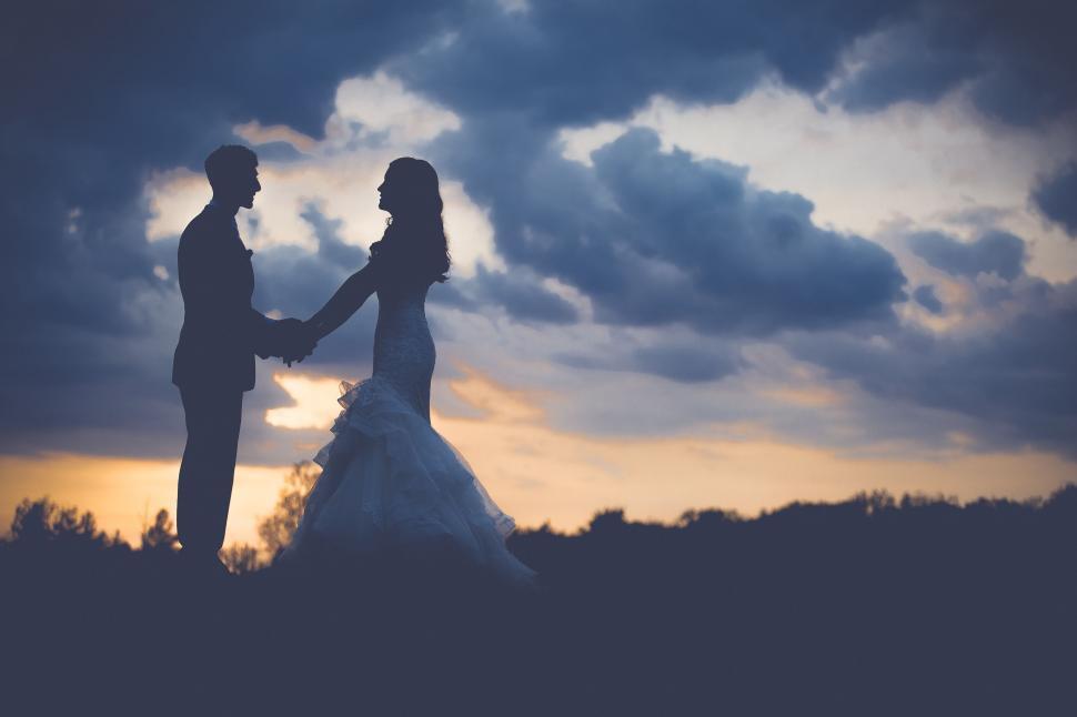 couple-holding-each-other-hands-